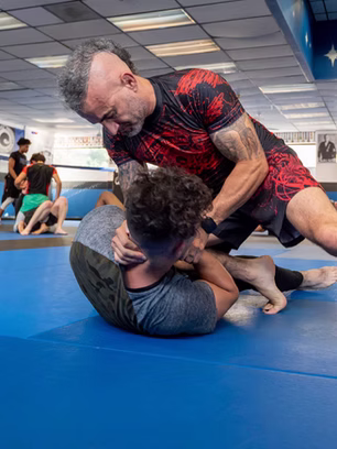 Practice match in BJJ gym